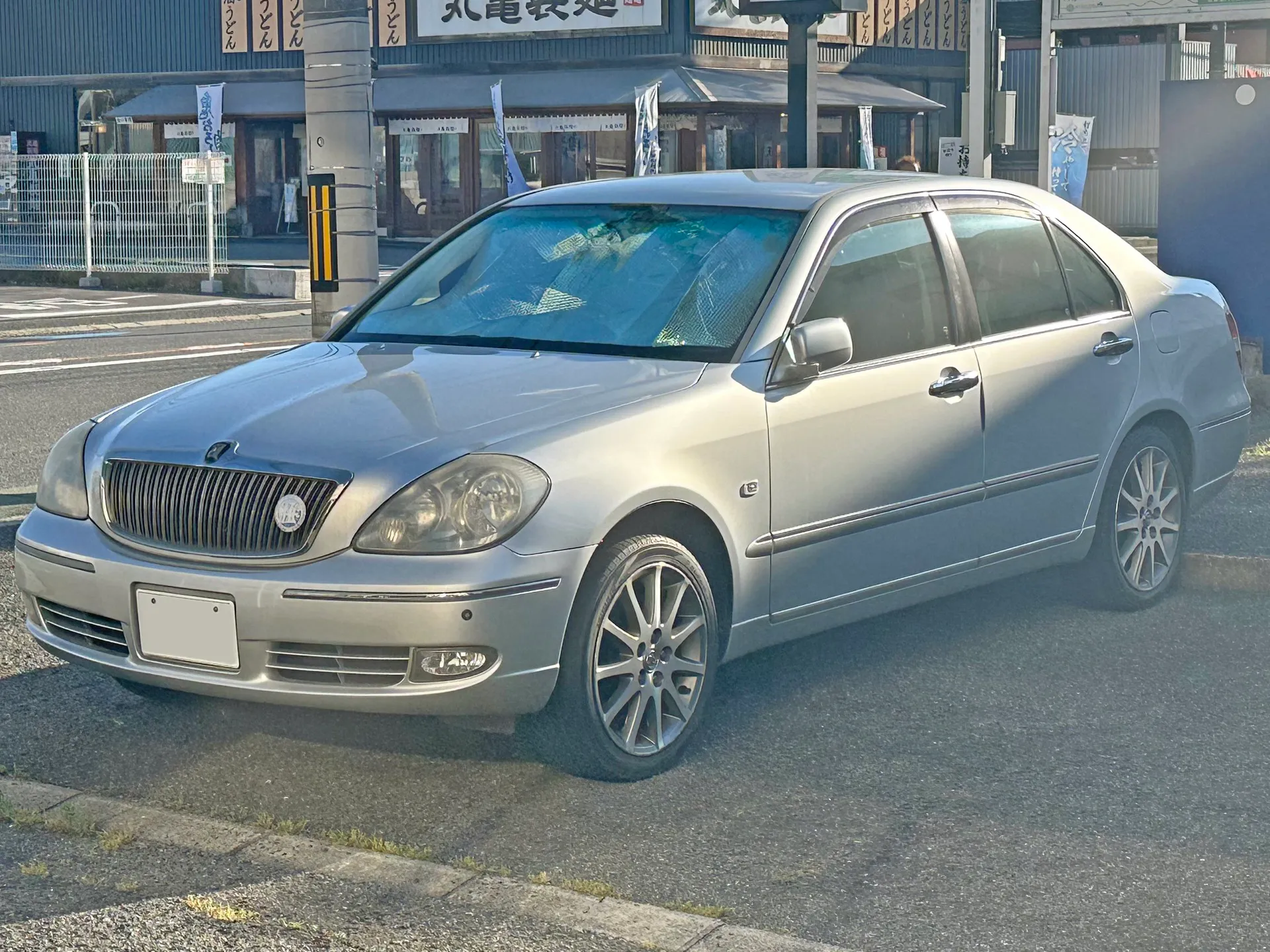 トヨタ ブレビス Ai250（TA-JCG10）を斜め前から見た外観